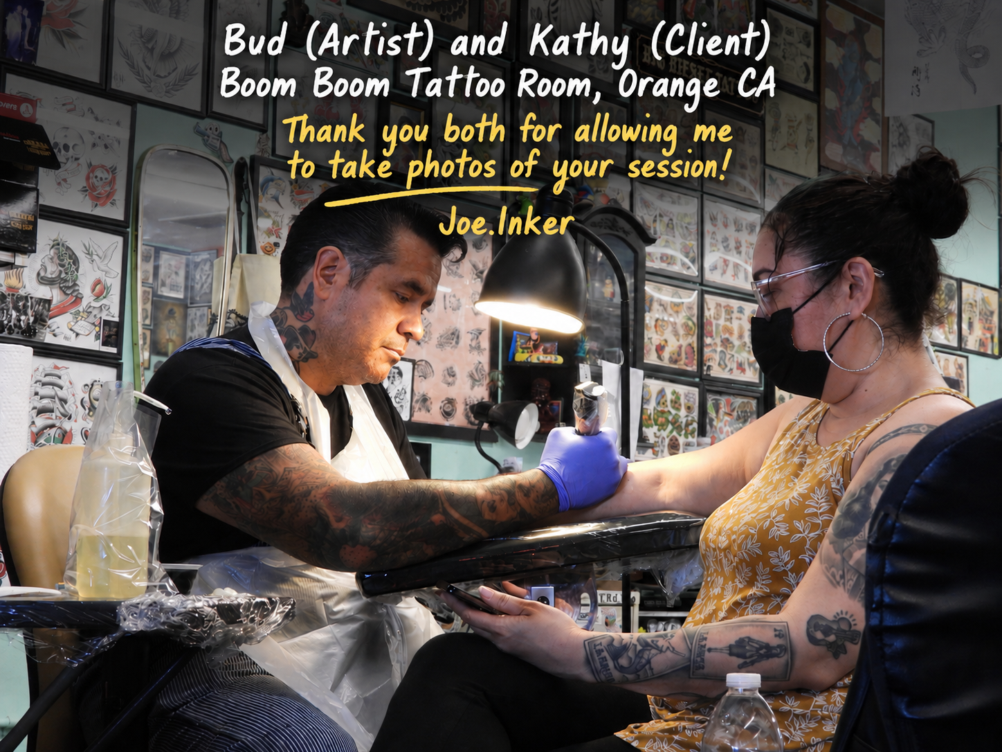 What Happens When Everyone's Trauma Dumps Into Your Chair — The Emotional Weight Tattoo Artists Carry Tattoo artist working on a client during a session inside a tattoo shop with flash art on the walls